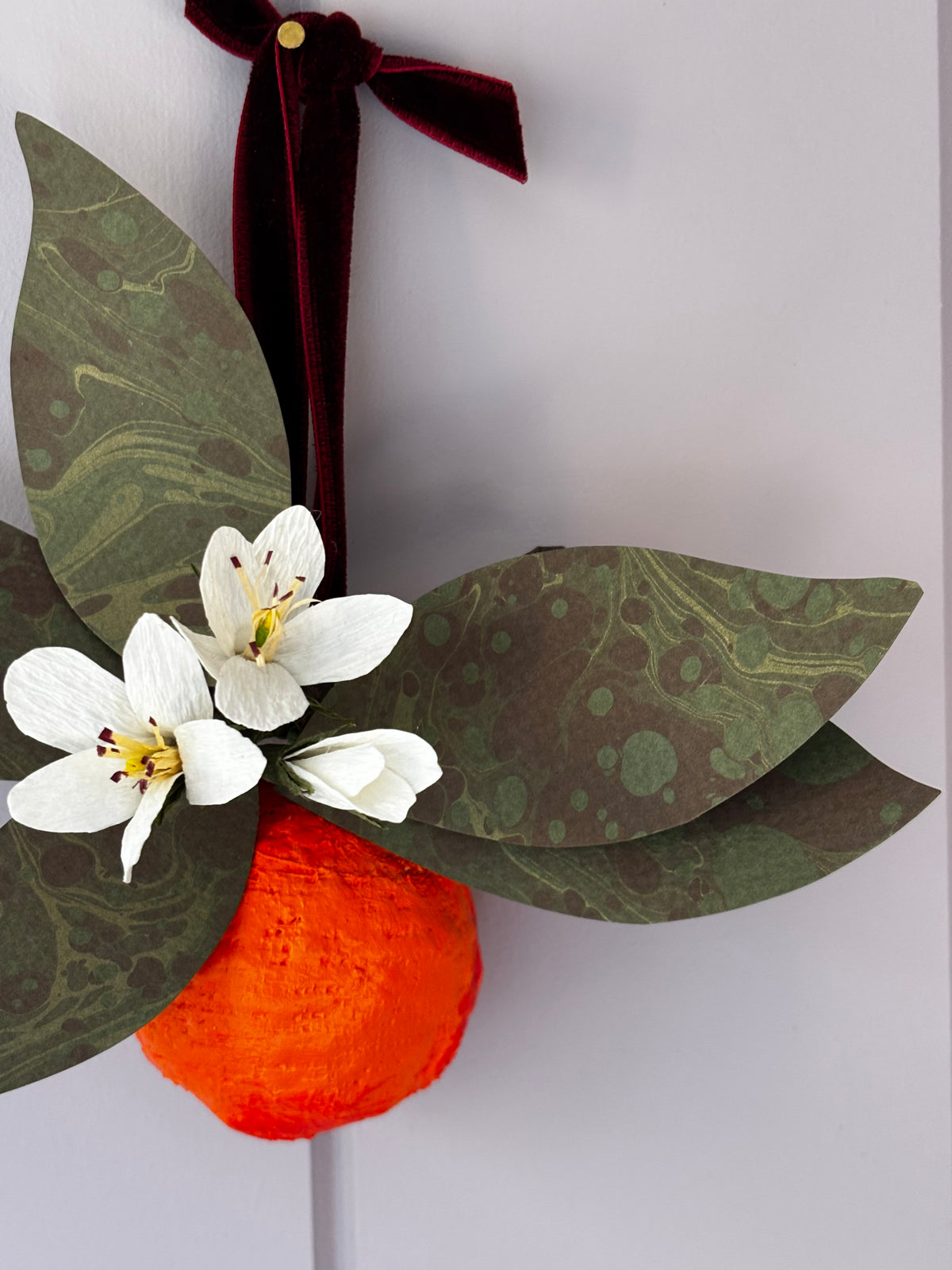Orange and blossom wall hanging