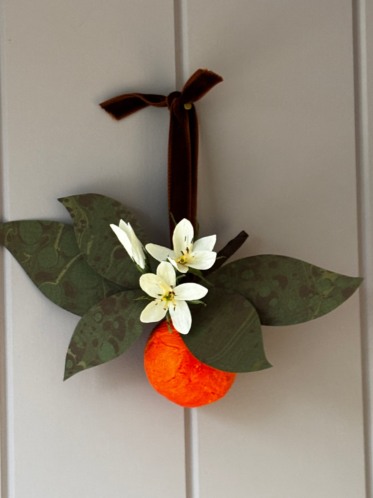Orange and blossom wall hanging