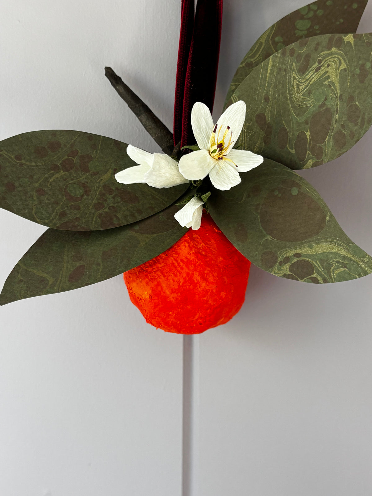 Orange and blossom wall hanging