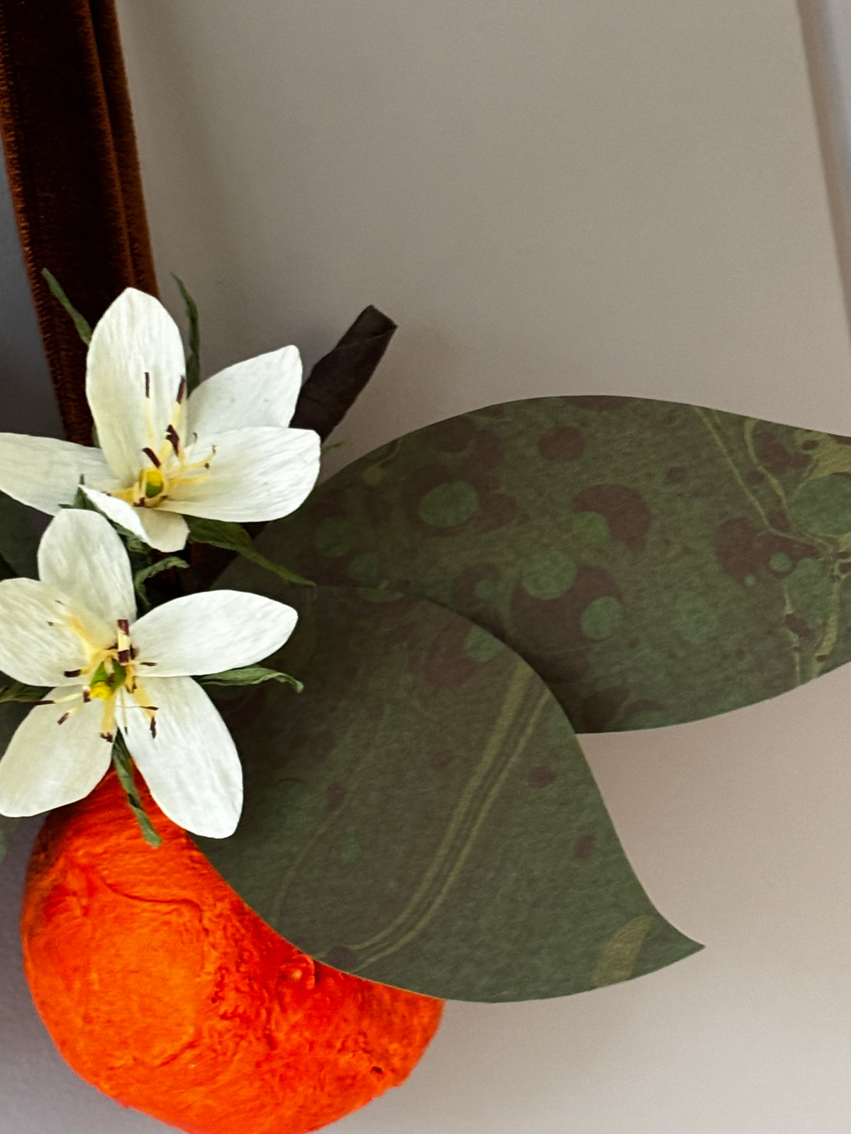 Orange and blossom wall hanging