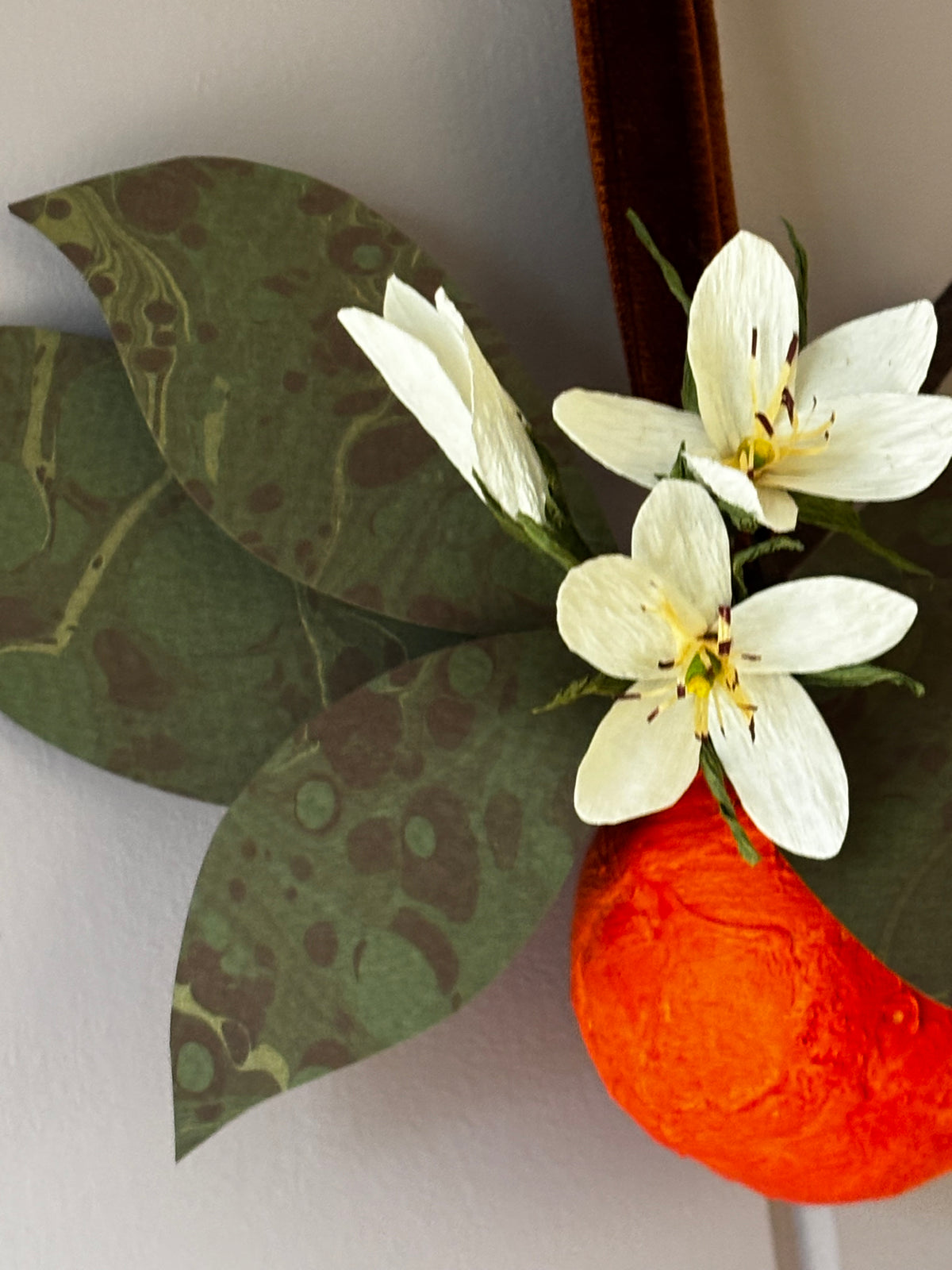 Orange and blossom wall hanging