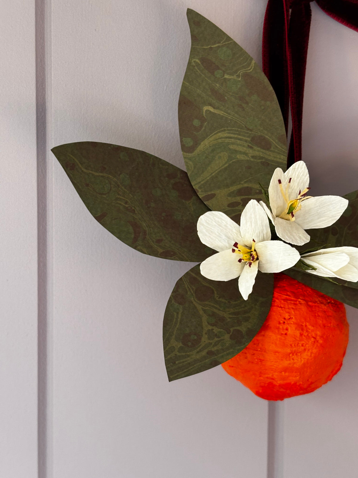 Orange and blossom wall hanging