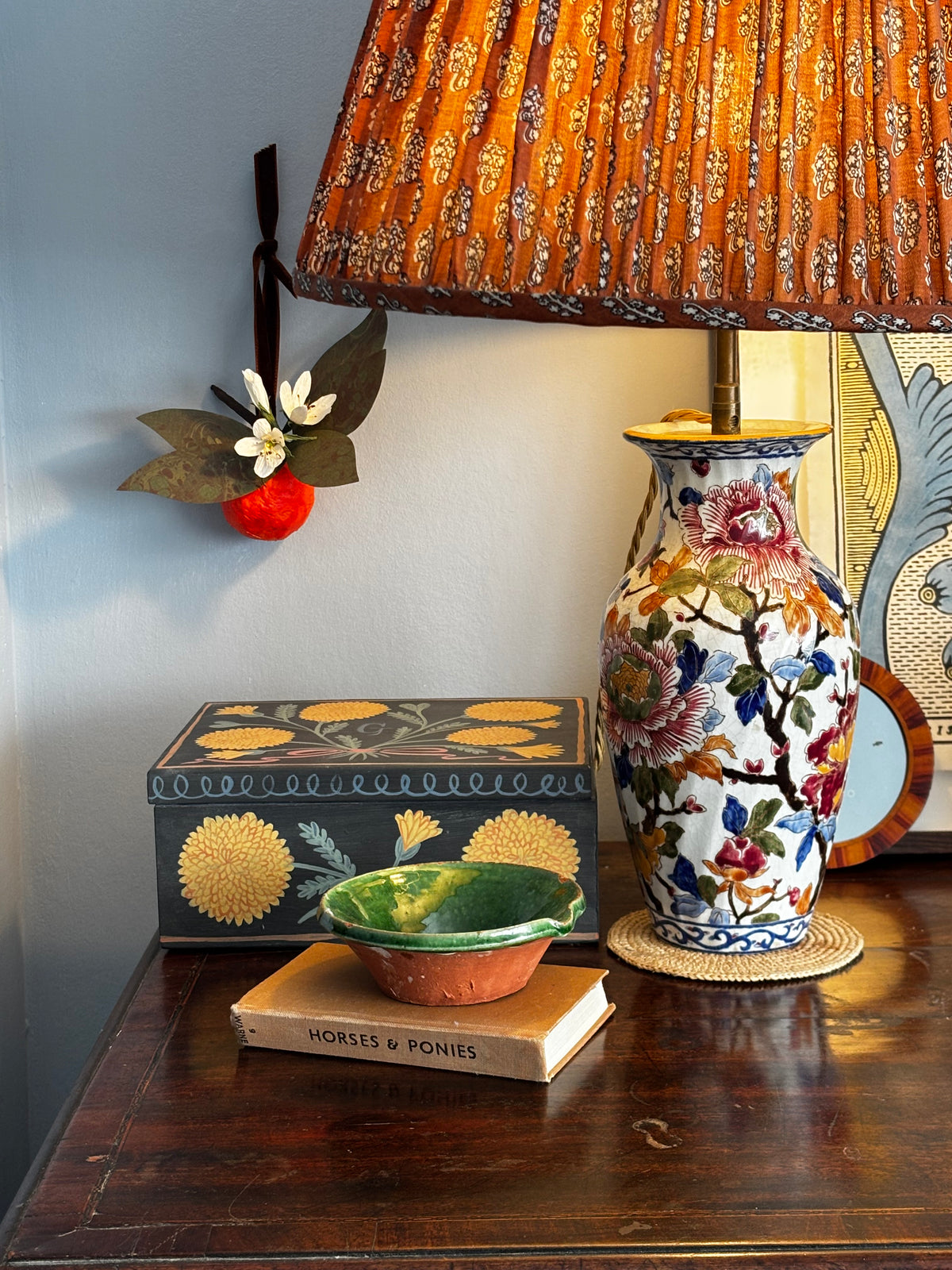 Orange and blossom wall hanging